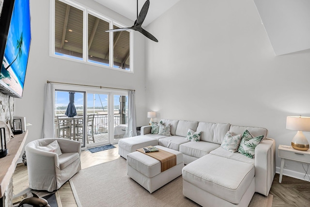 1948 Marsh Oak Ln, Seabrook Island, SC 29455 - living area featuring a high ceiling, a ceiling fan, and a water view
