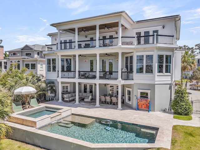 1720 Bowline Dr, Mount Pleasant, SC 29466 - rear view of house featuring a balcony, a ceiling fan, outdoor lounge area, french doors, and stucco siding