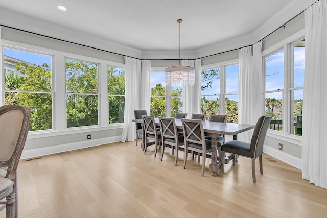 1720 Bowline Dr, Mount Pleasant, SC 29466 - dining area with baseboards, plenty of natural light, light wood-type flooring, crown molding, and recessed lighting