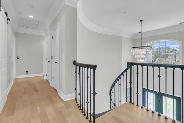 1720 Bowline Dr, Mount Pleasant, SC 29466 - hall with an upstairs landing, attic access, wood finished floors, crown molding, and baseboards