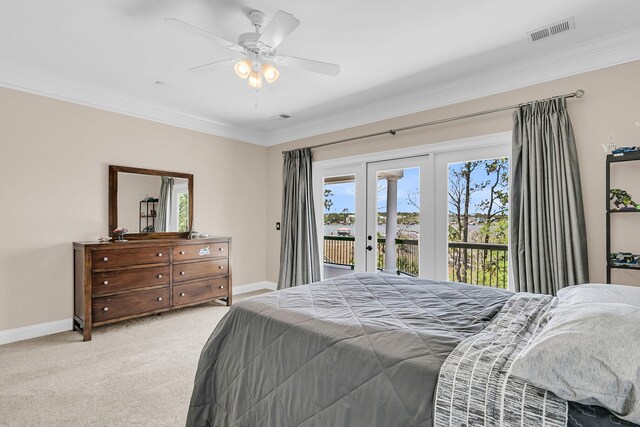1720 Bowline Dr, Mount Pleasant, SC 29466 - bedroom featuring access to outside, ornamental molding, multiple windows, french doors, and light colored carpet