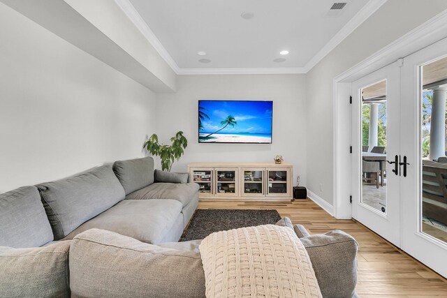 1720 Bowline Dr, Mount Pleasant, SC 29466 - living room with light wood-style floors, crown molding, recessed lighting, and baseboards