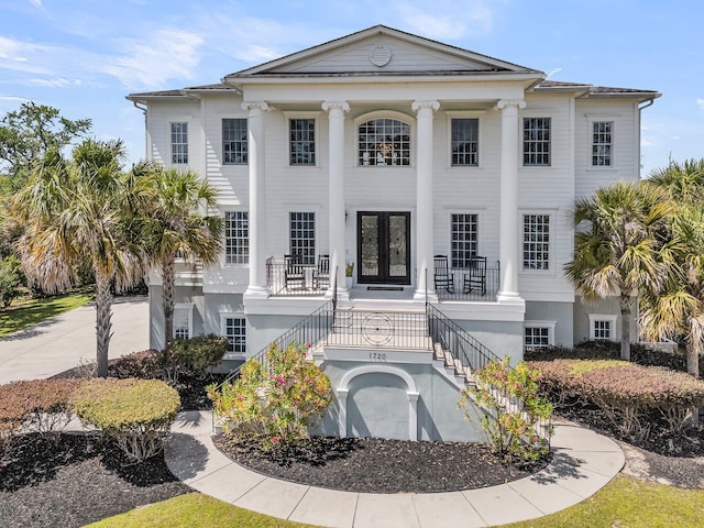 1720 Bowline Dr, Mount Pleasant, SC 29466 - view of front of house featuring stairway, covered porch, and french doors