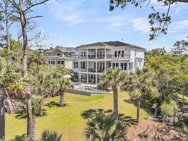 1720 Bowline Dr, Mount Pleasant, SC 29466 - back of house with a balcony, a yard, a pool with connected hot tub, and french doors