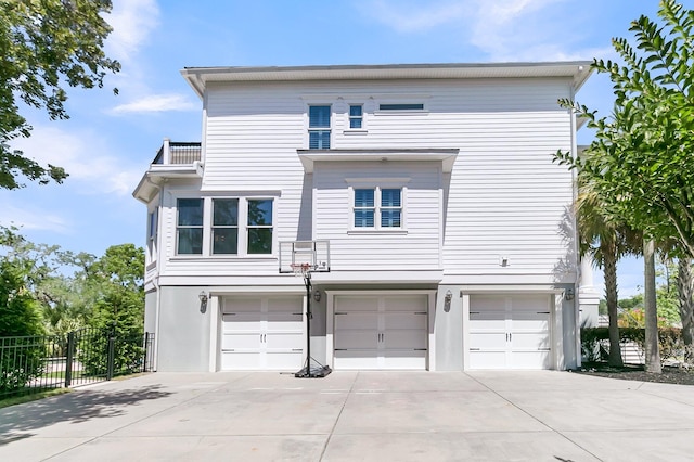 1720 Bowline Dr, Mount Pleasant, SC 29466 - view of front of home featuring a garage, driveway, and a balcony