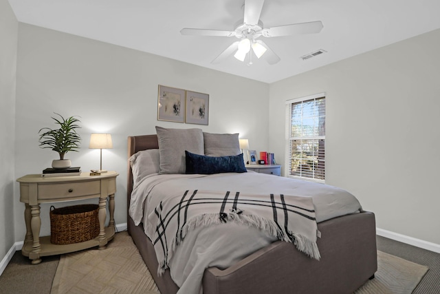 bedroom with ceiling fan and carpet