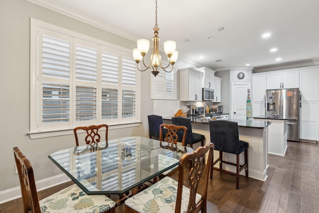 dining area with crown molding, baseboards, a chandelier, recessed lighting, and dark wood-style floors