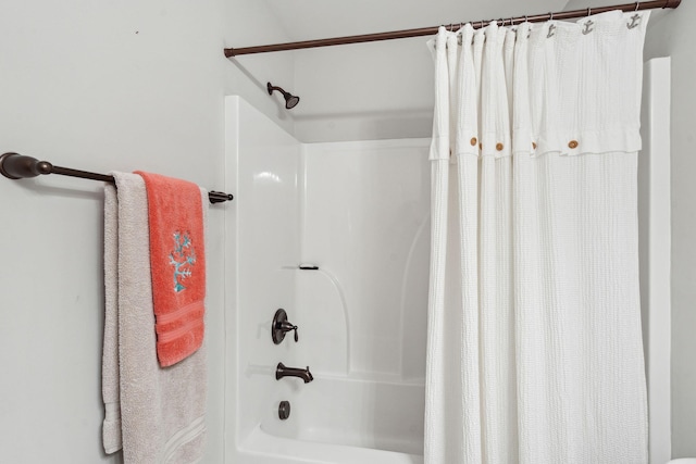 bathroom with shower / tub combo with curtain