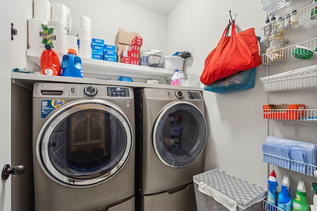 washroom with laundry area and washing machine and clothes dryer