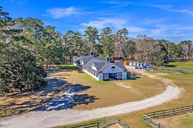 birds eye view of property featuring a rural view