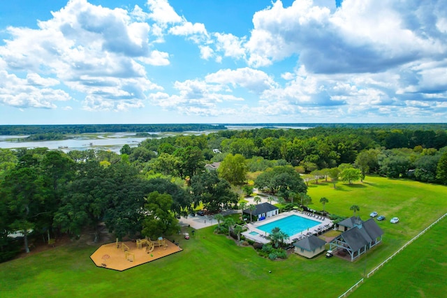 bird's eye view featuring a water view and a wooded view