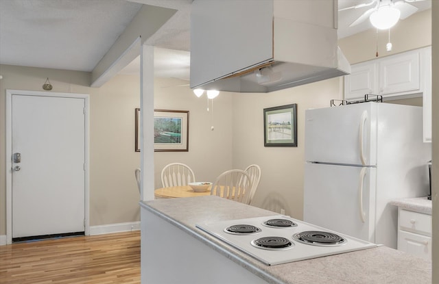 kitchen featuring white appliances, ceiling fan, light countertops, light wood-style floors, and white cabinetry