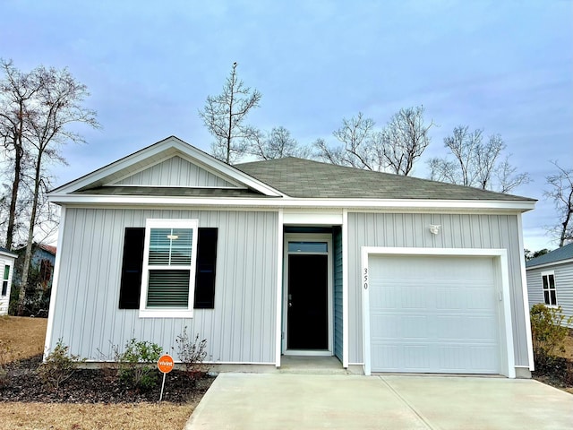 single story home featuring a garage