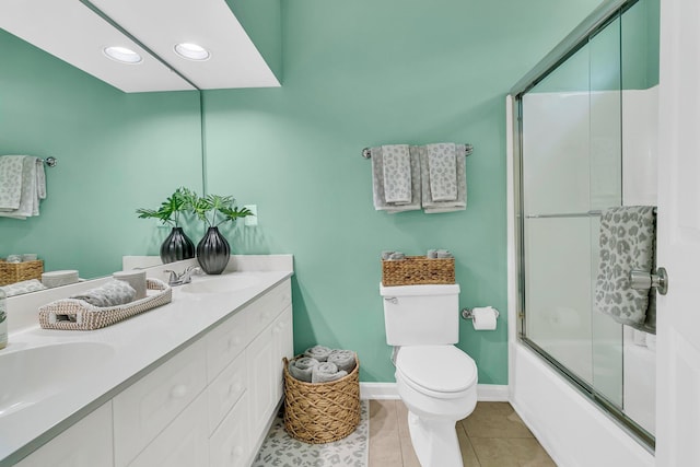 1682 Camfield Ln, Mount Pleasant, SC 29466 - bathroom featuring double vanity, enclosed tub / shower combo, tile patterned floors, and recessed lighting