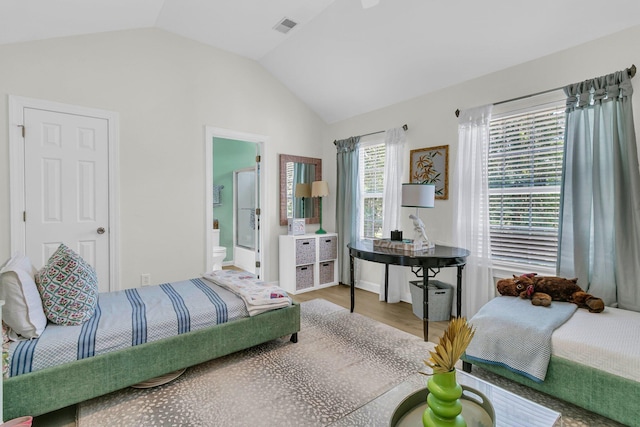 1682 Camfield Ln, Mount Pleasant, SC 29466 - bedroom featuring wood finished floors, lofted ceiling, and connected bathroom