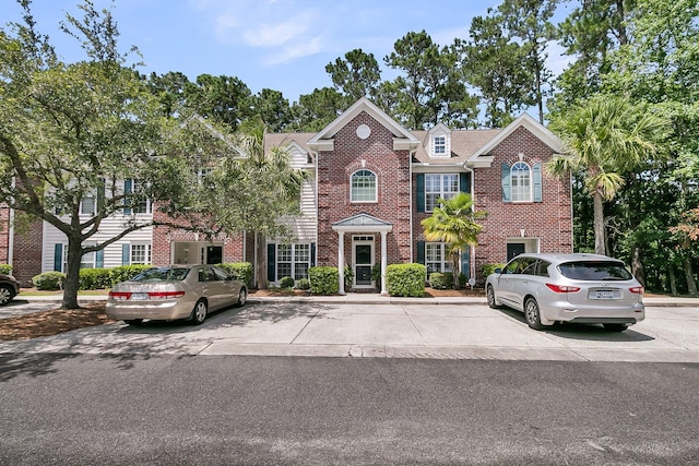 1682 Camfield Ln, Mount Pleasant, SC 29466 - view of front of house with brick siding and uncovered parking