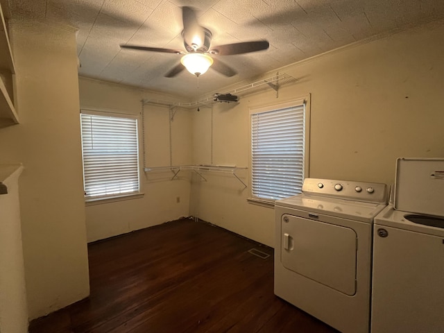 laundry room featuring separate washer and dryer, crown molding, dark hardwood / wood-style floors, and ceiling fan