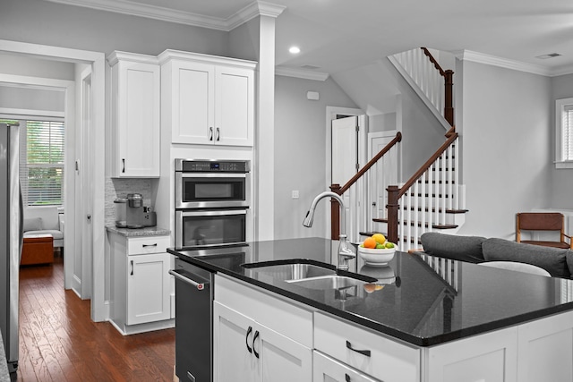 410 Eliston St, Summerville, SC 29486 - kitchen featuring a sink, crown molding, a kitchen island with sink, dark wood-style floors, and white cabinets