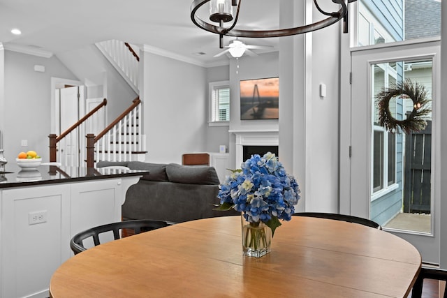410 Eliston St, Summerville, SC 29486 - dining area featuring stairs, ornamental molding, healthy amount of natural light, a fireplace, and recessed lighting