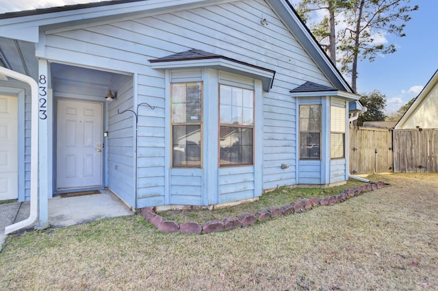 exterior space featuring a front lawn