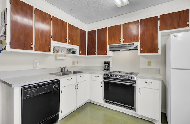 kitchen featuring sink, a textured ceiling, dishwasher, white fridge, and range with electric cooktop