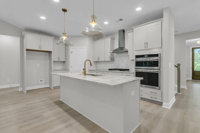 395 Wappoo Trace Ln, Summerville, SC 29486 - kitchen with wall chimney exhaust hood, a sink, gas cooktop, double oven, and baseboards