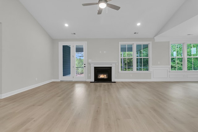 395 Wappoo Trace Ln, Summerville, SC 29486 - unfurnished living room featuring lofted ceiling, plenty of natural light, light wood-type flooring, a ceiling fan, and recessed lighting