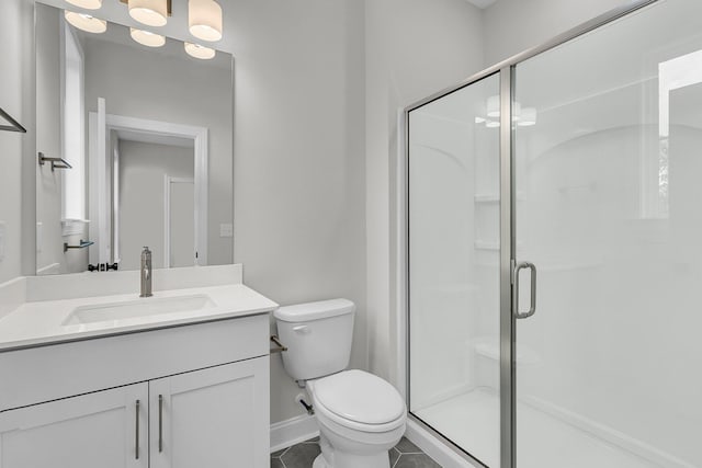 395 Wappoo Trace Ln, Summerville, SC 29486 - full bathroom with vanity, toilet, a stall shower, tile patterned floors, and baseboards