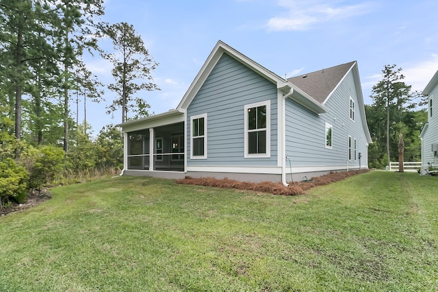 395 Wappoo Trace Ln, Summerville, SC 29486 - rear view of property featuring a sunroom and a lawn