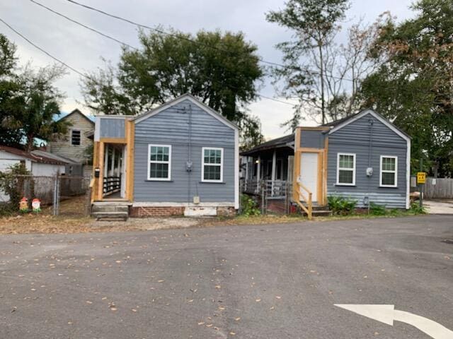 view of front of property with fence