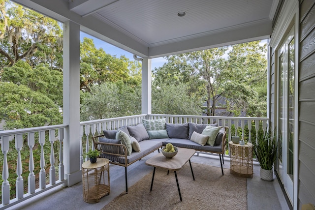 2206 Weepoolow Trl, Charleston, SC 29407 - sunroom with an outdoor hangout area and view of wooded area