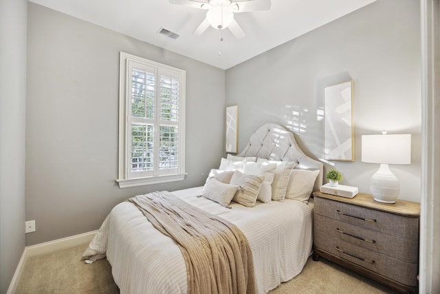2206 Weepoolow Trl, Charleston, SC 29407 - bedroom with light carpet, baseboards, and ceiling fan