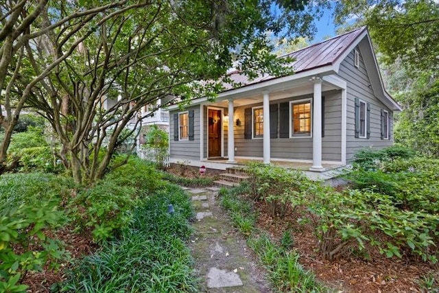 2206 Weepoolow Trl, Charleston, SC 29407 - view of front facade with covered porch and metal roof