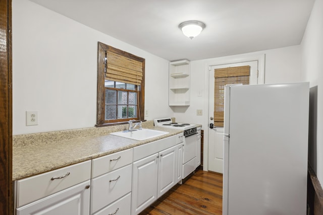 2206 Weepoolow Trl, Charleston, SC 29407 - kitchen with white appliances, a sink, white cabinets, dark wood-type flooring, and light countertops