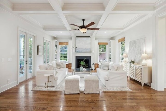 2206 Weepoolow Trl, Charleston, SC 29407 - living room with a fireplace, beam ceiling, coffered ceiling, ceiling fan, and french doors