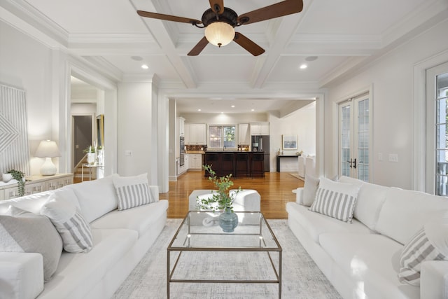 2206 Weepoolow Trl, Charleston, SC 29407 - living room with coffered ceiling, light wood-style flooring, ornamental molding, beamed ceiling, and a ceiling fan