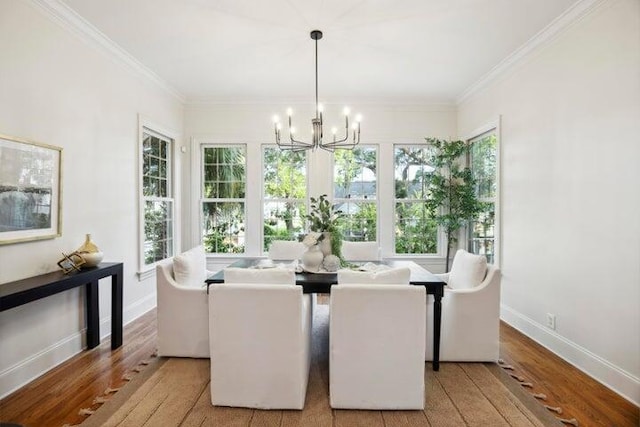 2206 Weepoolow Trl, Charleston, SC 29407 - dining space featuring a chandelier, light wood-style flooring, ornamental molding, and baseboards