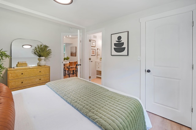 2608 Seymour Ave, North Charleston, SC 29405 - bedroom featuring light wood-type flooring and ensuite bath