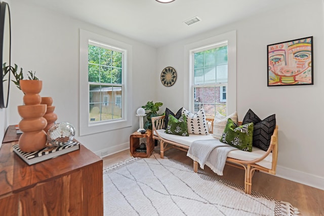 2608 Seymour Ave, North Charleston, SC 29405 - sitting room with plenty of natural light and wood finished floors