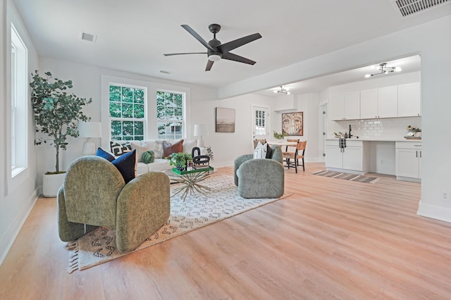 2608 Seymour Ave, North Charleston, SC 29405 - living room featuring light wood-style floors and ceiling fan