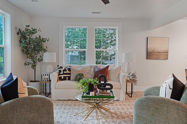 2608 Seymour Ave, North Charleston, SC 29405 - living area featuring healthy amount of natural light and wood finished floors