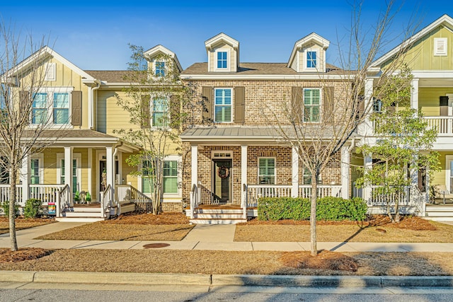 view of property featuring a porch