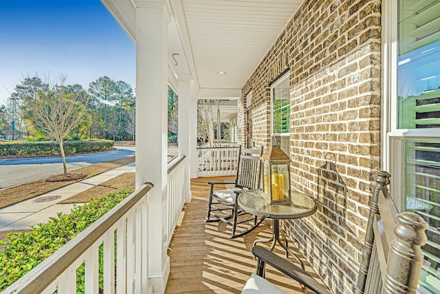 balcony featuring covered porch