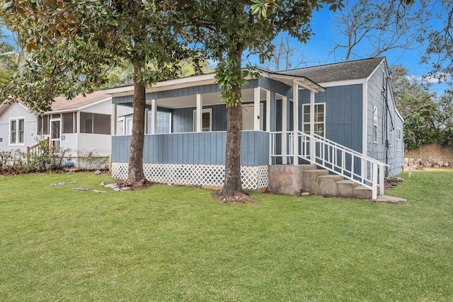 view of front of home with a front yard