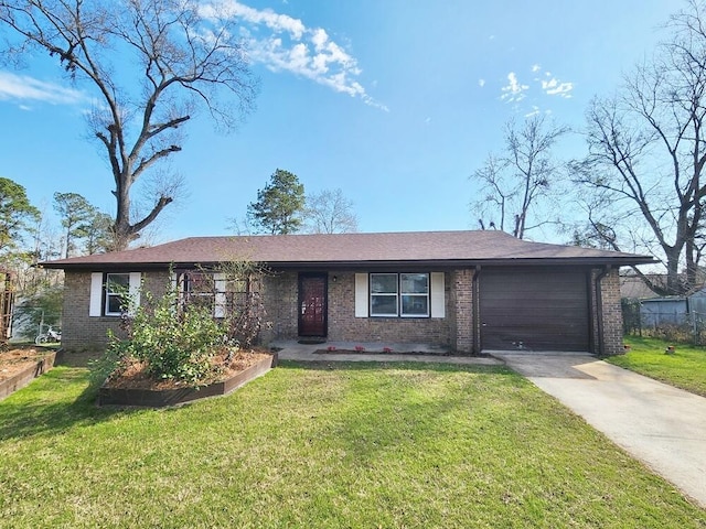 single story home with a garage and a front lawn