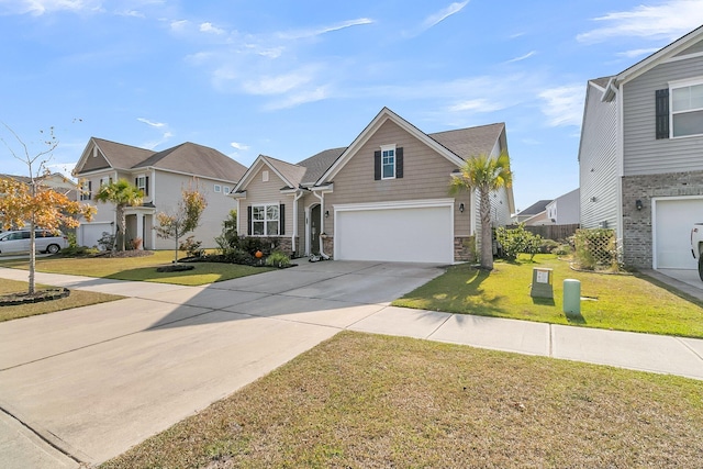 view of front of house with a front lawn and a garage