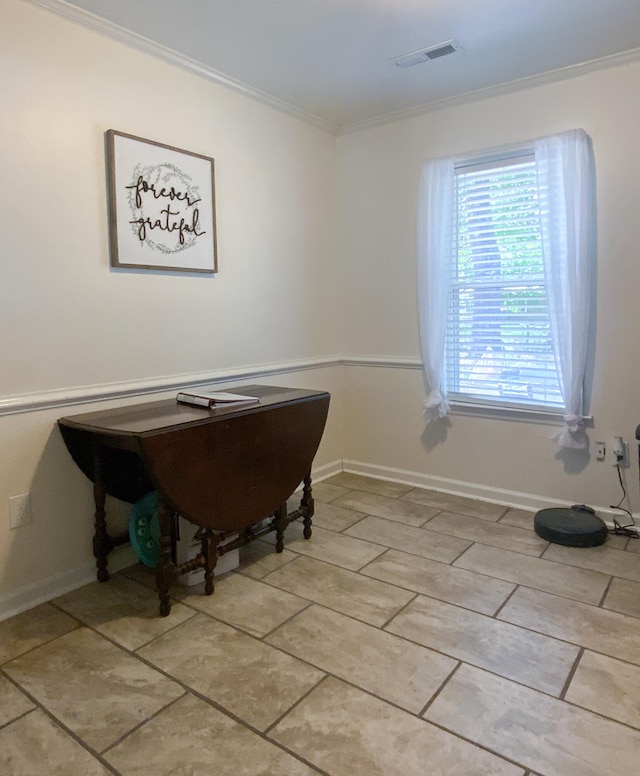 interior space featuring crown molding