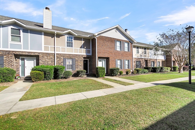 view of property with a front yard