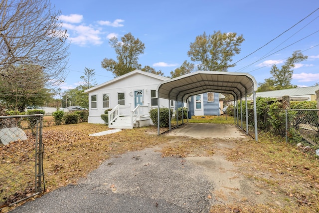 view of front facade featuring a carport