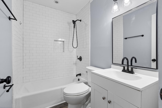 full bathroom with vanity, bathtub / shower combination, and toilet